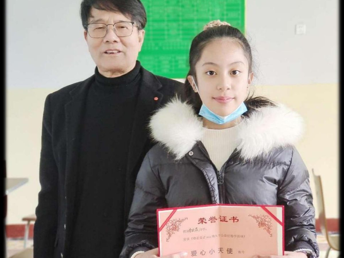 指导老师与获奖学员合影